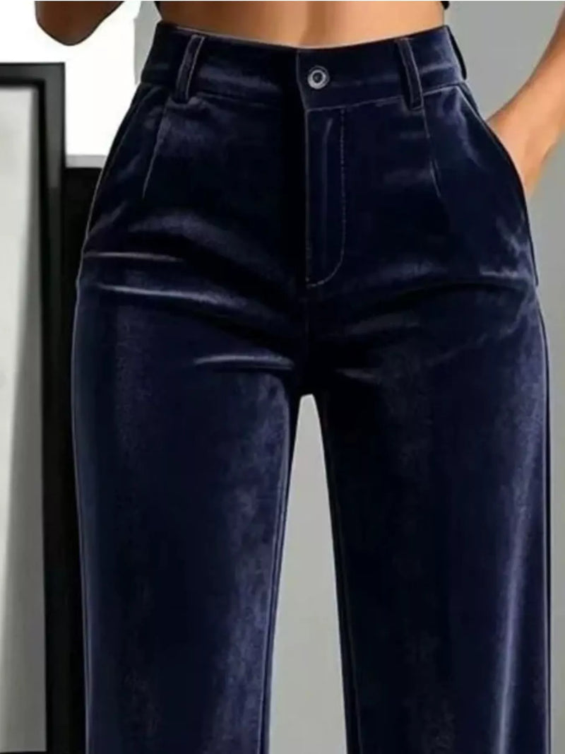 A picture of a lady wearing purple Full Size High-Waisted Velvet Pants Plus Size