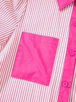 Close-up of a pink and white striped shirt with a pink pocket.