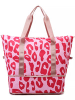 Pink tote bag with red leopard print pattern on a white background