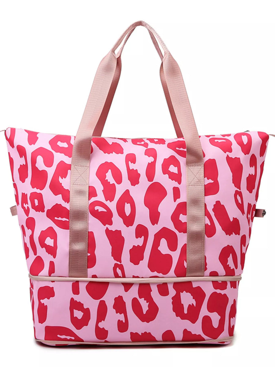 Pink tote bag with red leopard print pattern on a white background