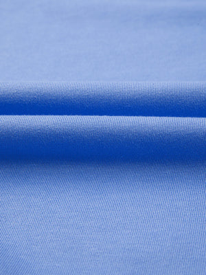 Close-up of blue fabric with a subtle pattern