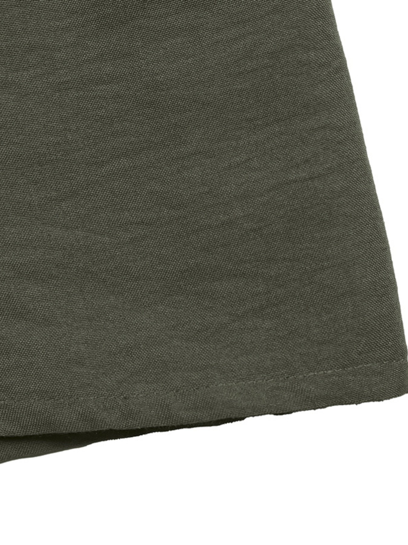 Close-up of a dark green fabric texture on a white background