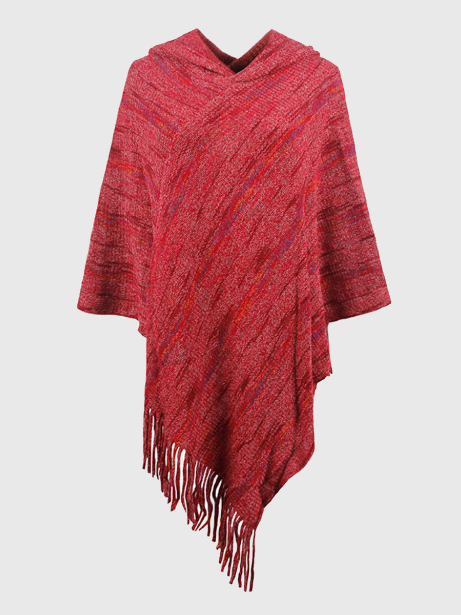 Red poncho with fringe on a white background