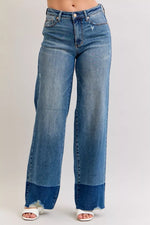 Blue jeans with a white background