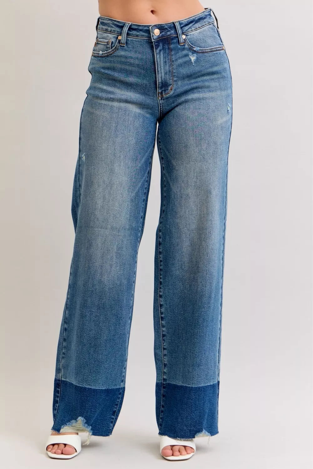 Blue jeans with a white background