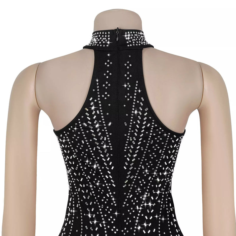 Black sleeveless top with sparkling white stones on a mannequin against a white background