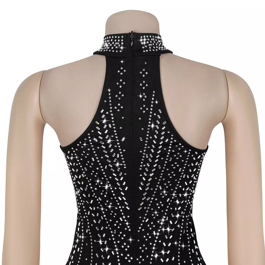 Black sleeveless top with sparkling white stones on a mannequin against a white background
