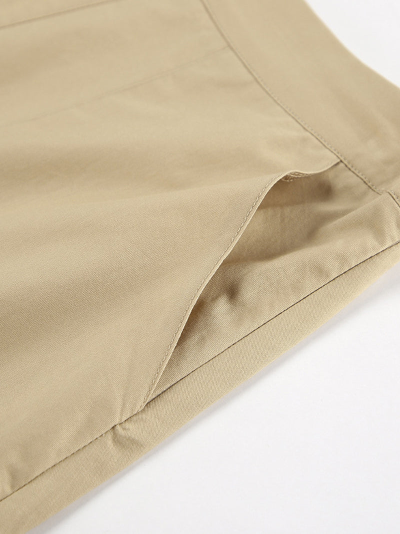 Close-up of beige fabric with a white background