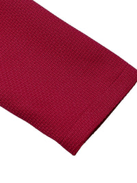 Close-up of a red knitted fabric on a white background