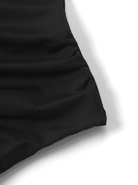 Close-up of a black fabric texture on a white background