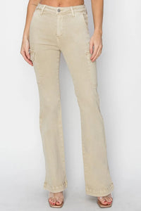 Beige jeans worn by a person on a white background