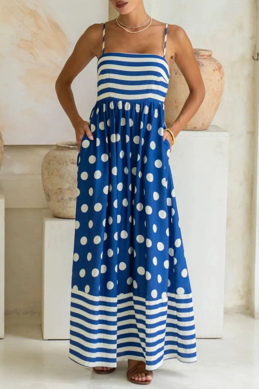 Model showing pockets on blue Polka Dot Square Neck Cami Dress