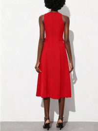 Red dress worn by a person on a white background