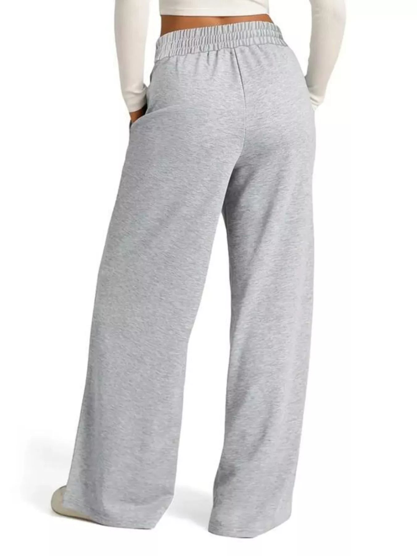 Gray sweatpants worn by a mannequin on a white background