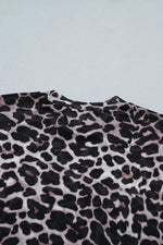 Leopard print fabric on a light gray background