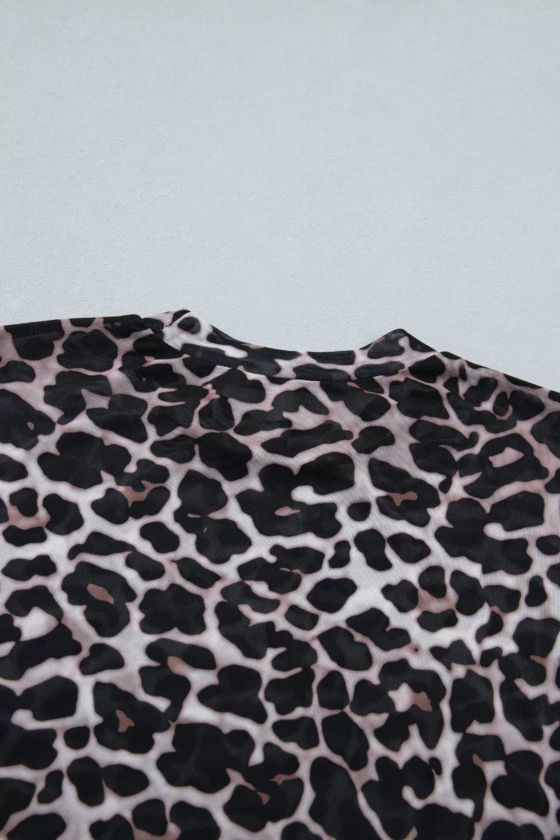 Leopard print fabric on a light gray background