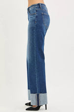 Blue jeans with a white background