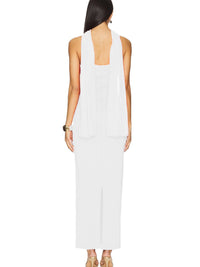 Woman wearing a white sleeveless dress on a white background