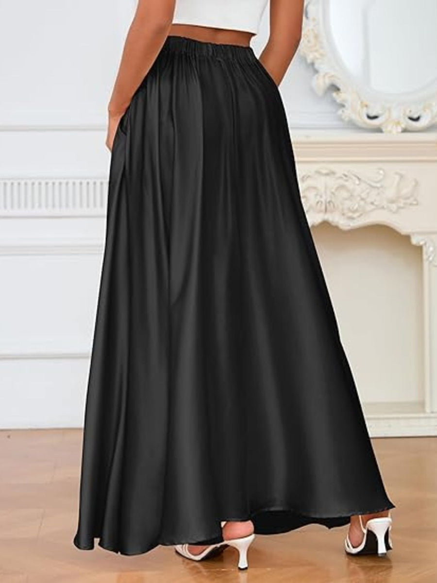 Person wearing a black skirt in an indoor setting