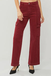 Maroon cargo pants worn by a person on a plain background
