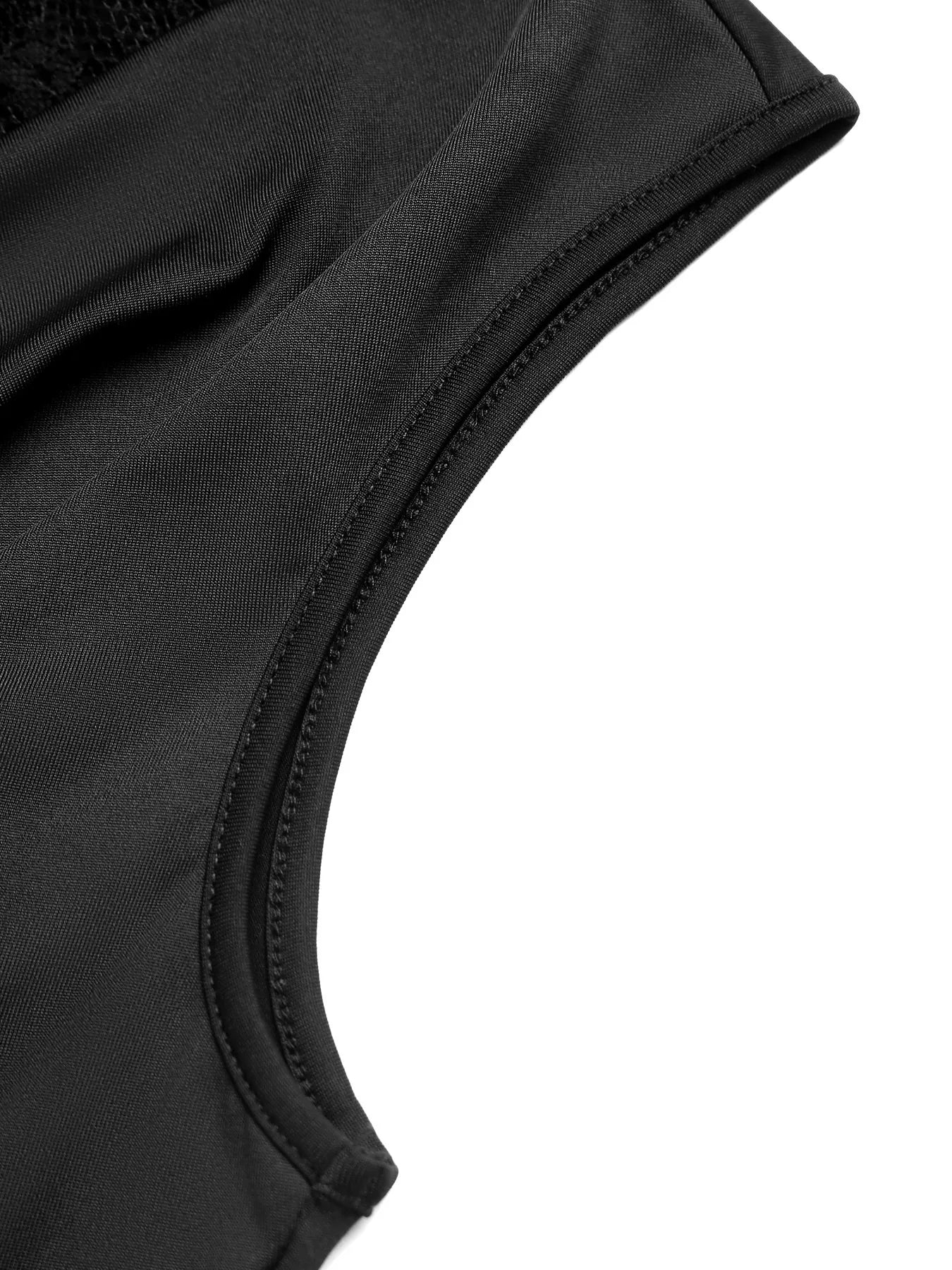 Close-up of a black swimsuit top on a white background