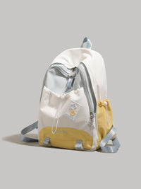 White and yellow backpack with a clear front pocket on a gray background