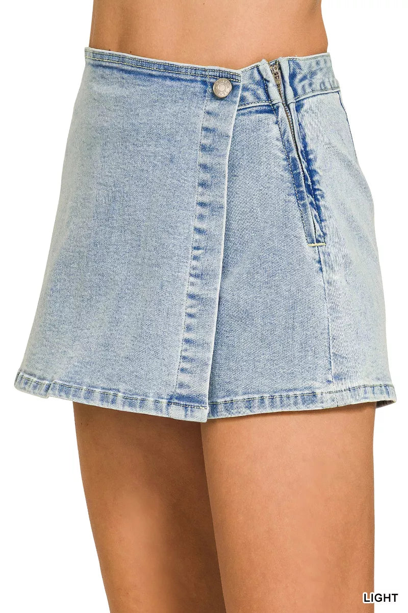 Light blue denim skirt on a white background