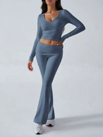 Woman wearing a blue athletic outfit on a white background