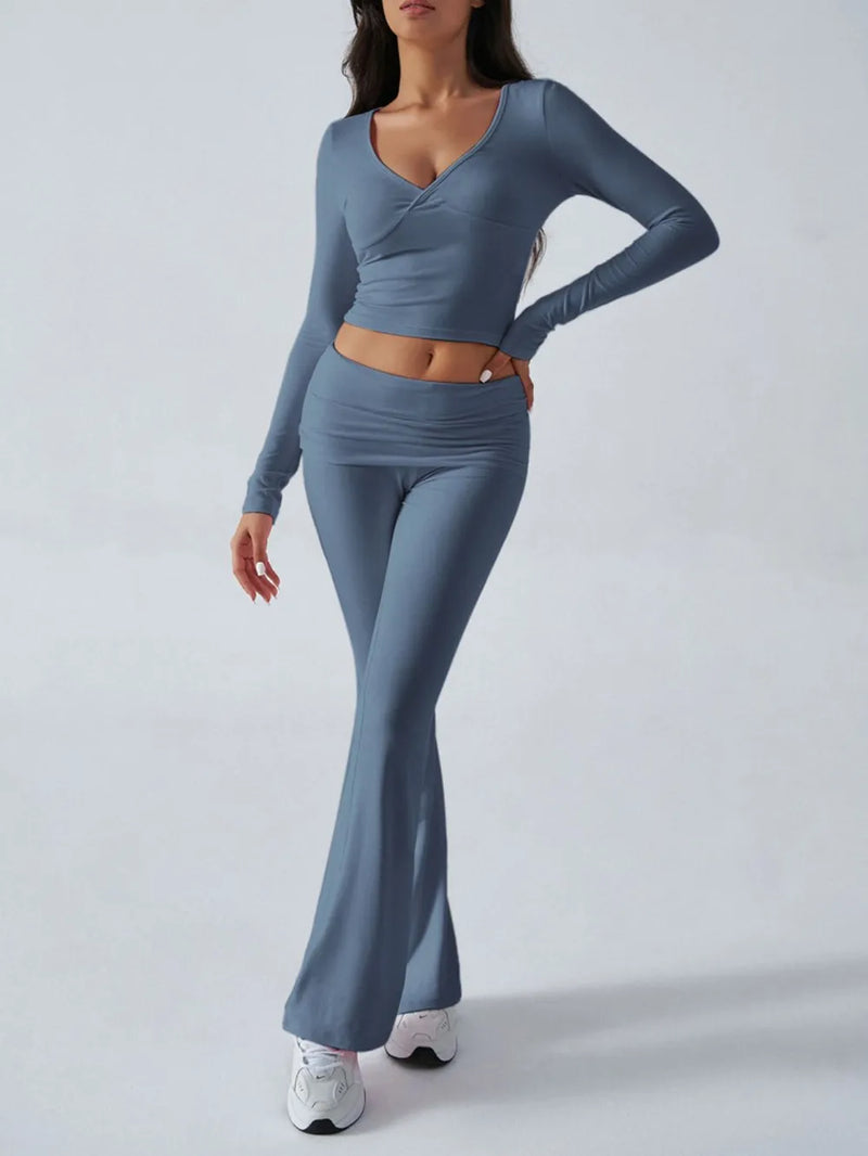 Woman wearing a blue athletic outfit on a white background