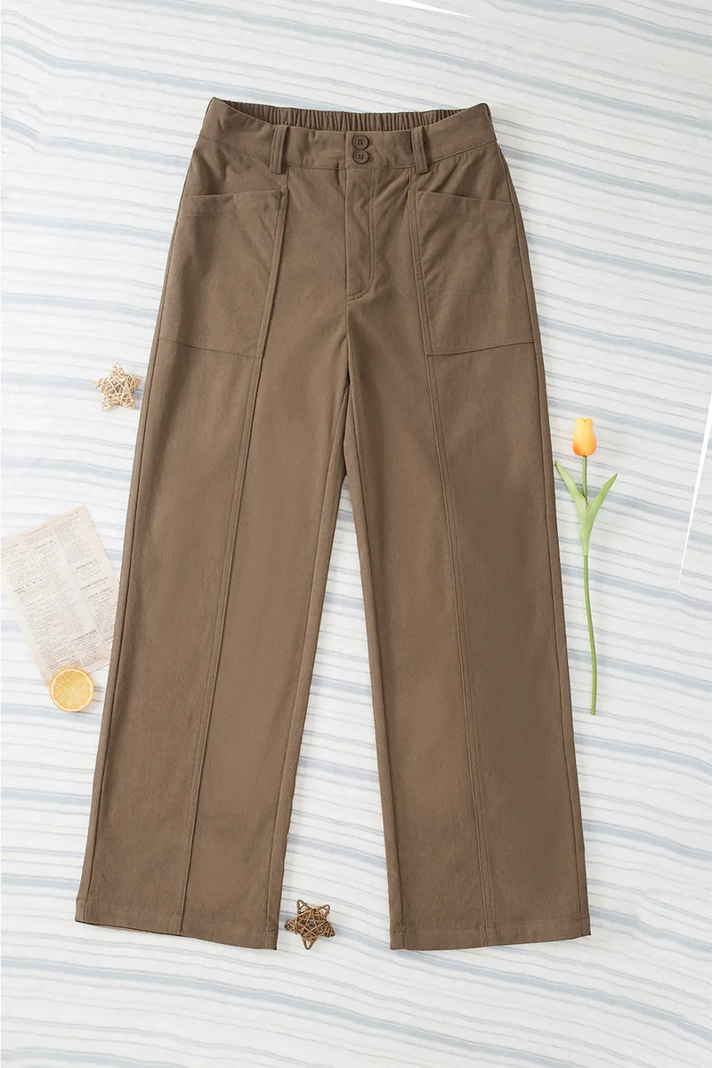 Brown pants on a textured white background