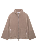 Beige fleece jacket with zippers on a white background