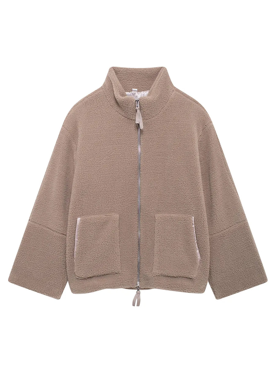 Beige fleece jacket with zippers on a white background