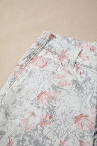 Floral patterned shorts on a beige background
