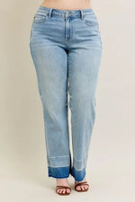 Light blue jeans on a beige background