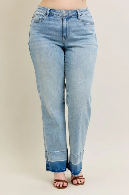 Light blue jeans on a beige background
