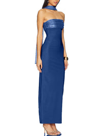 Woman wearing a blue strapless gown on a white background