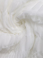 Close-up of white textured fabric
