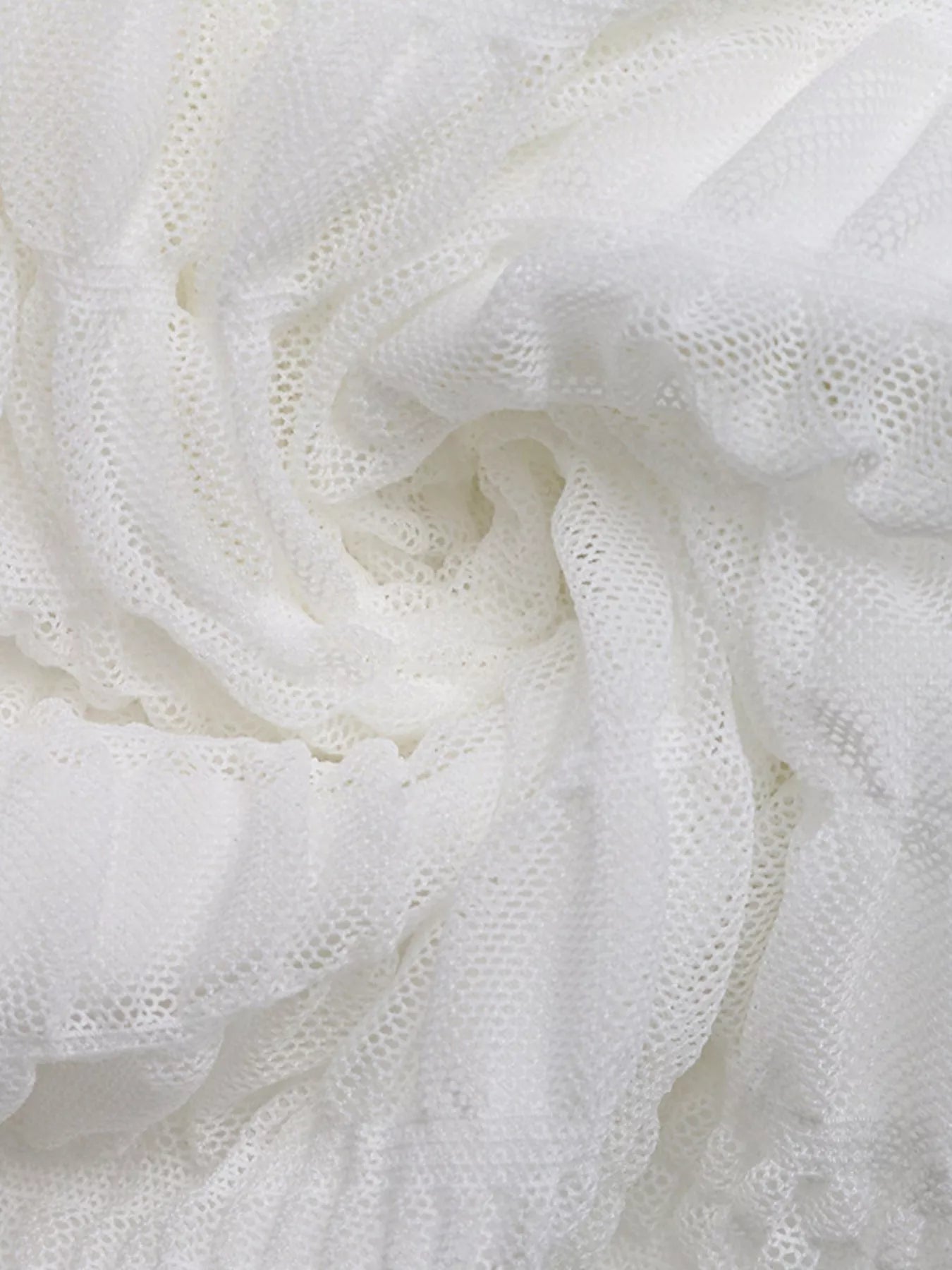 Close-up of white textured fabric