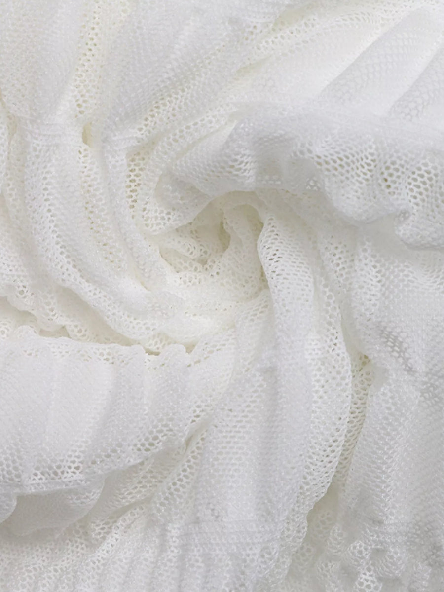 Close-up of white textured fabric