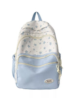 Light blue and white patterned backpack on a white background