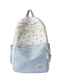 Light blue and white patterned backpack on a white background