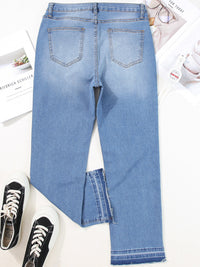 Light blue jeans with a casual cut on a white background
