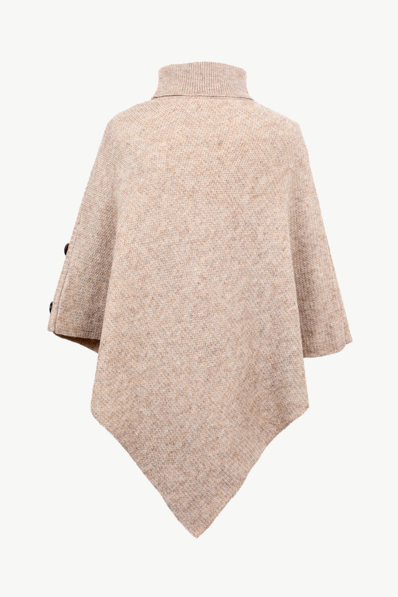 Beige poncho on a white background