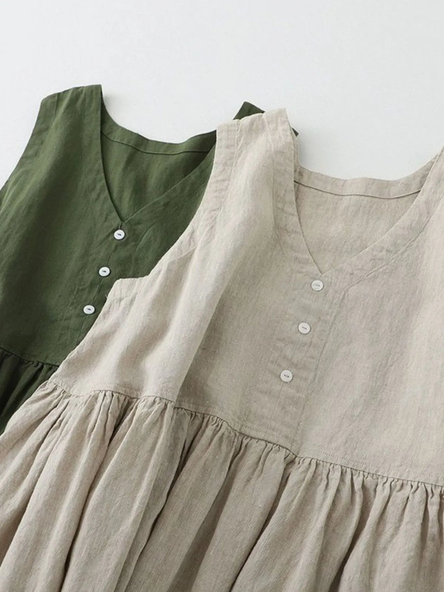 Two dresses, one green and one beige, with a plain background