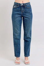 Blue jeans on a plain background