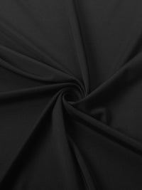 Close-up of black fabric with folds