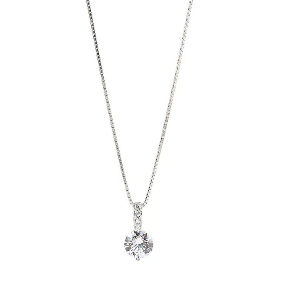 Silver necklace with a round pendant on a white background