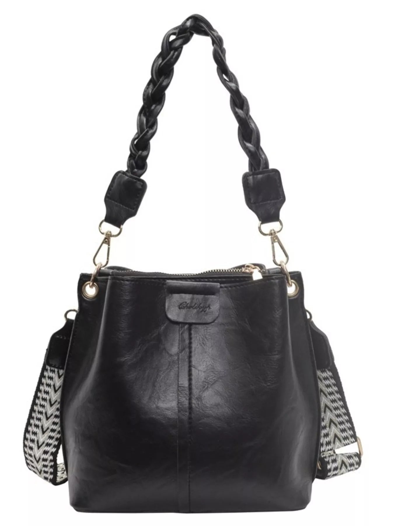 Black leather handbag with braided handle on a white background