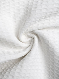 Close-up of textured white fabric