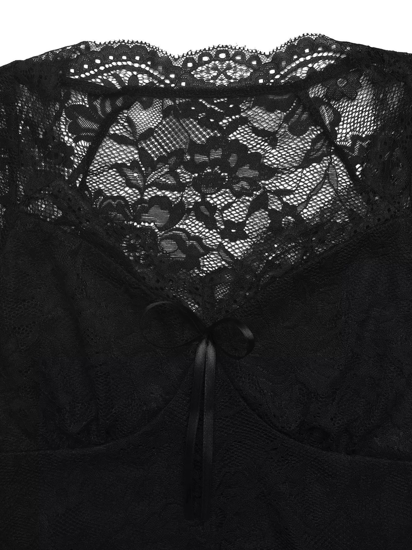 Black lace garment with a close-up of the lace detailing.